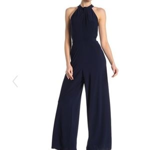 Nina Leonard twist halter navy knit jumpsuit